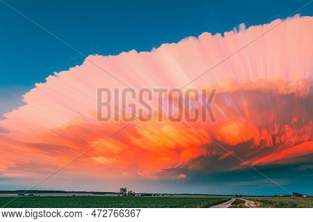 Long Exposure Fasters Clouds Above Countryside Rural Field Landscape. Amazing Effects Of Smeared Clo