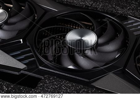 Video Card With Three Coolers From The Computer On A Dark Background.concept Computer Harware