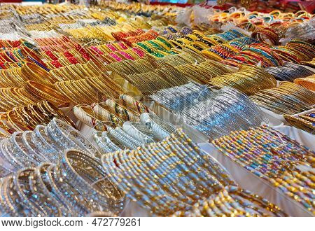 Colorful Bangles From A Shop In Bangladesh, Background Of Colorful Bangles Stacked With Glitter And 