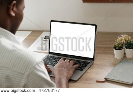 Mockup, Blank Screen Laptop Computer. Business Man Working On Laptop Computer On Table At Office. Mo