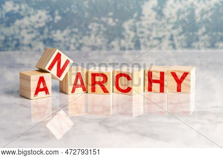 Group Of Wooden Cubes Conceptualizing Anarchy And Disorder. High Quality Photo