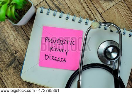 Concept Of Polycystic Kidney Disease Write On Sticky Notes With Stethoscope Isolated On Wooden Table