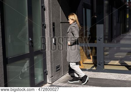Smart Home Concept - Close Up Of Woman Use Mobile Phone To Open Electronic Lock