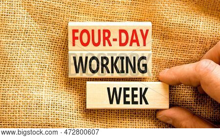 Four-day Working Week Symbol. Concept Words Four-day Working Week On Wooden Block On A Beautiful Can