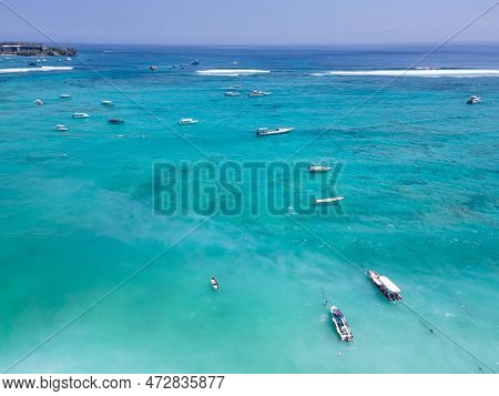 Aerial View Of Tourist Speedboat Anchored At Nusa Lembongan. One Of Travel Destinations Close To Bal