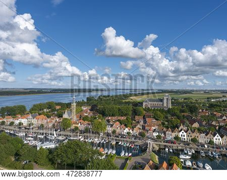 Aerial View Over Veere With The Historic Town Hall And The Great Church. In The Background The Veers