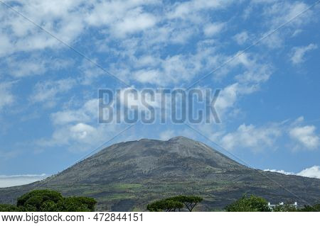 A Mountain Vesuvius With A Blue Sky And Clouds - Is A Somma-stratovolcano Located On The Gulf Of Nap