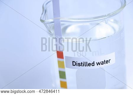 Distilled Water In Bottle ,sample Ph Water In The Laboratory And Industry