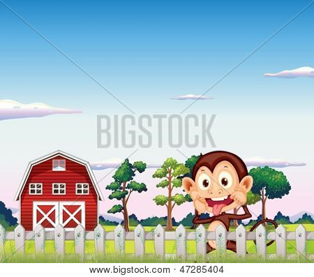 ภาพประกอบของลิงใกล้ barnhouse สีแดง