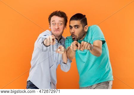 Portrait Of Two Comic Amazed Men Friends Standing And Pointing At Camera, Choosing You, Having Finny