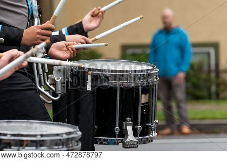 High School Marching Band Keeping Perfect Cadence.