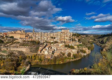 Toledo, Spain - Nov 30, 2022: Old City With Its Alcazar, Royal Palace Over The Tagus River Sinuosity