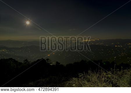Pearls Of Light Of Queen Of Hills, Darjeeling Town, At Night At Far Right. Full Moon On The Night Sk
