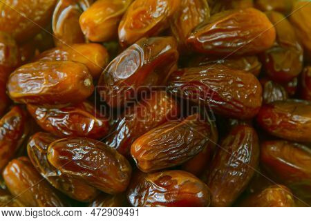 Dates. Dried Date Palm Fruits. Healthy Sweet Snack Food Pile Of Tasty Dry Dattes. Date Harvest Symbo