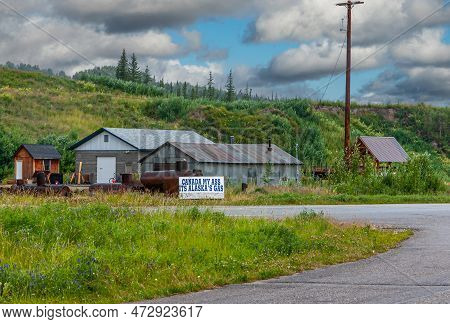 Goldstream, Alaska, Usa - July 26, 2011: Canada My Ass It Is Alaska Gas, Billboard Near Farmstead In