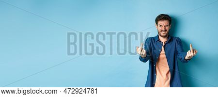 Angry Caucasian Man Say Fuck You And Showing Middle Fingers, Make Rude Gesture With Pissed-off Face,