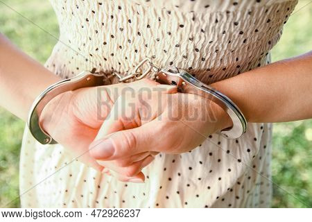 Man Handcuffed Outdoors In The Park A
