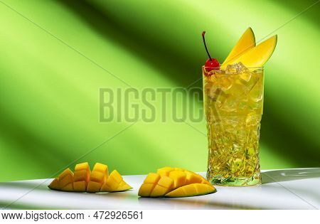 Mango Rum Collins Alcoholic Cocktail Drink With White Rum, Syrup, Ginger Beer, Lemon Juice, Ice And 