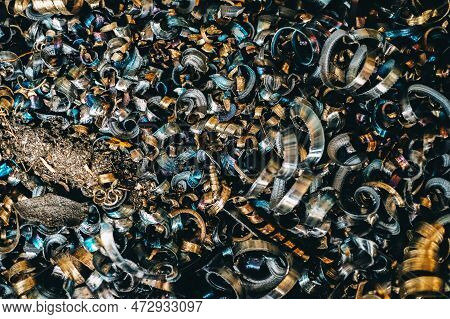 Steel Scrap Processing. Aluminum Shavings After Processing Metal Parts On A Cnc Lathe.