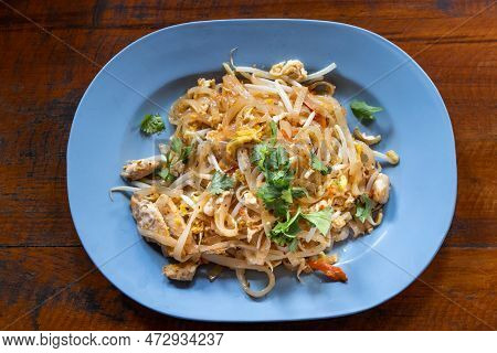 Overhead View Of Authentic And Simple No Frills Pad Thai, Popular Thailand Street Food Made Up Of Fr