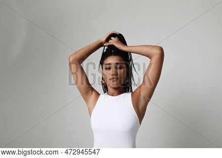 African American Beautiful Woman With Dark Braids, Overt White Background.