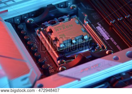 Close-up Of An Amd Ryzen 9 7900X Processor Installed On A Motherboard Asus Rog Strix X670E