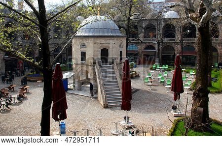Courtyard View Of The Two-story Koza Han Market With Shops And A Mosque In The Center In Bursa, Turk