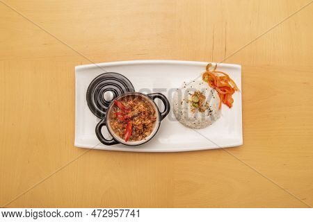 Top View Image Of Bicol Express Filipino Recipe Small Black Skillet With White Rice