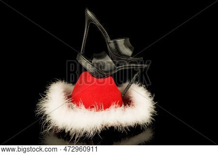 High Heel Shoes  On A Black Background