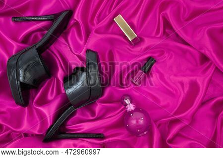 High Heel Shoes  On A Pink  Background