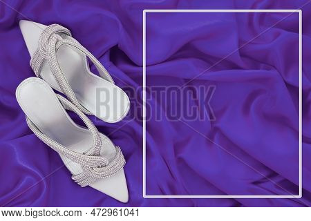 High Heel Shoes  On A Purple  Background