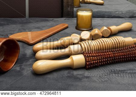 Wooden Devices To Apply Wood Therapy Massages With Rollers And Candles