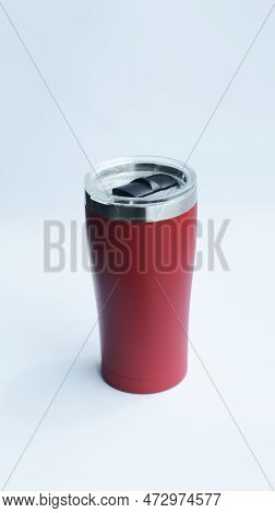 Red Stainless Steel Tumbler And Mug Vacuum Insulated Double Wall Travel Cup With Lid Isolated On Whi
