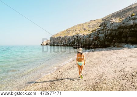 Aerial View Tourist Woman In Bikini Walk On White Sand Beach Alone In Persian Gulf Mirellas Island. 