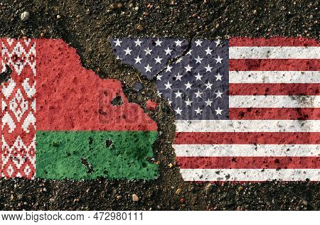 On The Pavement There Are Images Of The Flags Of Belarus And The Usa, As A Symbol Of The Confrontati