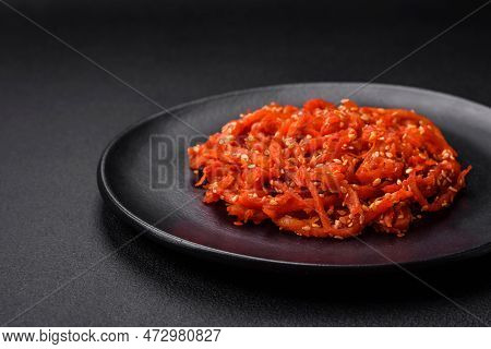 Dried Squid Chopped Into Slices And Seasoned With Sesame Seeds And Spices