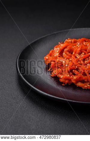 Dried Squid Chopped Into Slices And Seasoned With Sesame Seeds And Spices