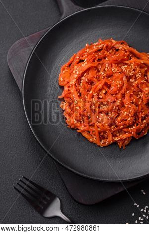 Dried Squid Chopped Into Slices And Seasoned With Sesame Seeds And Spices