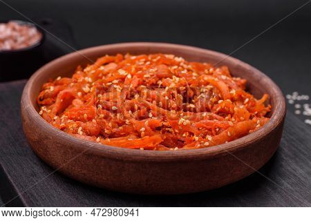 Dried Squid Chopped Into Slices And Seasoned With Sesame Seeds And Spices
