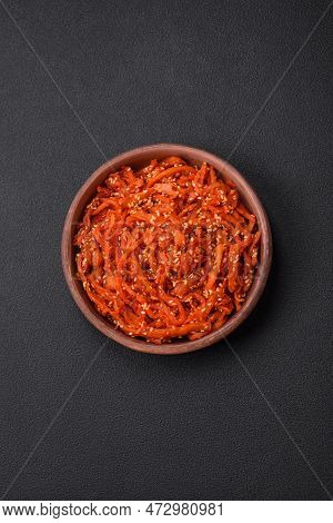 Dried Squid Chopped Into Slices And Seasoned With Sesame Seeds And Spices