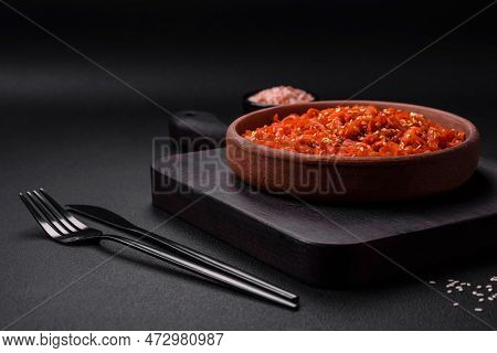 Dried Squid Chopped Into Slices And Seasoned With Sesame Seeds And Spices