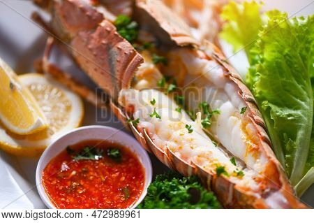 Spiny Lobster Food On Plate, Fresh Lobster Or Rock Lobster Seafood With Herb And Spices Lemon Corian