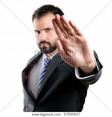 Young Businessman Doing Stop Sign Over White Background