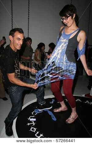 Adam Saaks and Claudia Lari at the Adam Saaks Flagship Store Opening, Adam Saaks Store, Los Angeles, CA. 10-10-10
