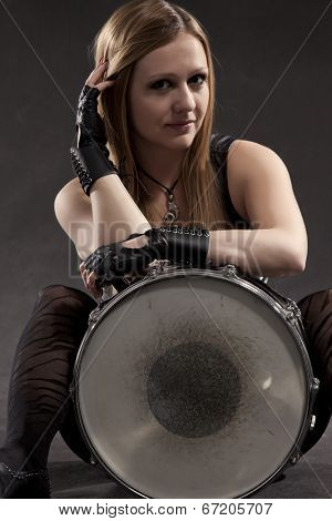 Young Woman Sitting With Drum; Indoor