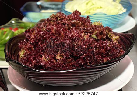 Fresh Red  Lettuce In Glass Bolwe