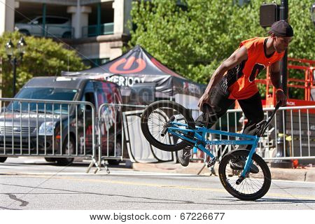 Man Practices Flatland Bmx Tricks Before Competition