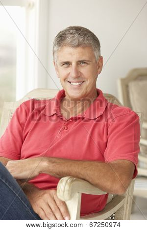 Mid age man at home