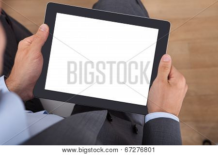 Businessman Holding Digital Tablet