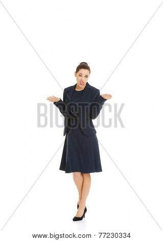 Anoyed and displeased businesswoman standing